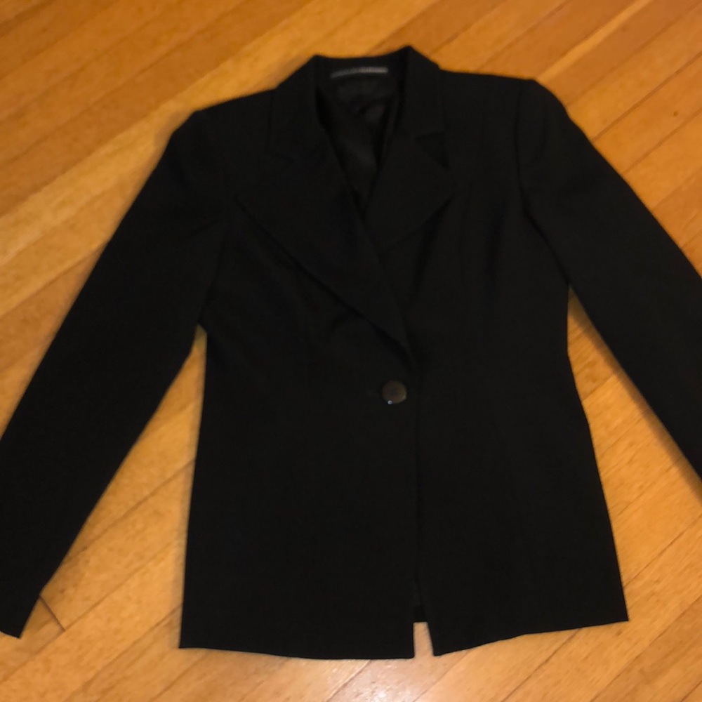 Black fitted blazer. Acetate, nylon, spandex.